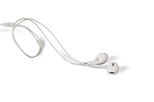 Ear buds represent real estate investing podcasts to listen to